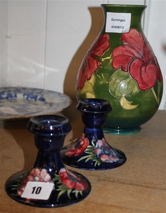 Moorcroft vase and a pair of small Moorcroft candlesticks